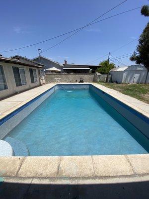 Newly pebbled & tiled pool in NoHo.  Customer decided on Aqua Blue Stonescapes mini pebble finish.