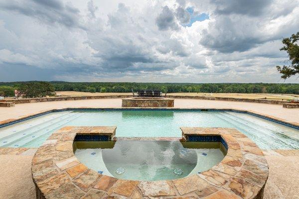 Spa and pool on hilltop East TX luxury ranch overlooking property