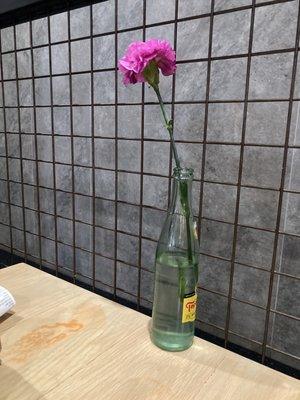 Dirty table? And a cute topo Chico vase & flower!