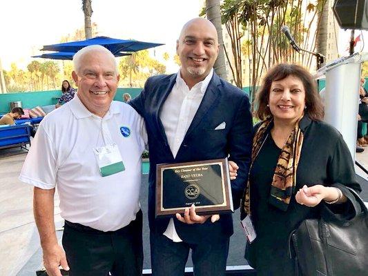 2019 DRY CLEANER of the year winner.(Jim Douglass president of The CCA, Sajid Veera & Yasmin Veera( founder of door to door cleaners)