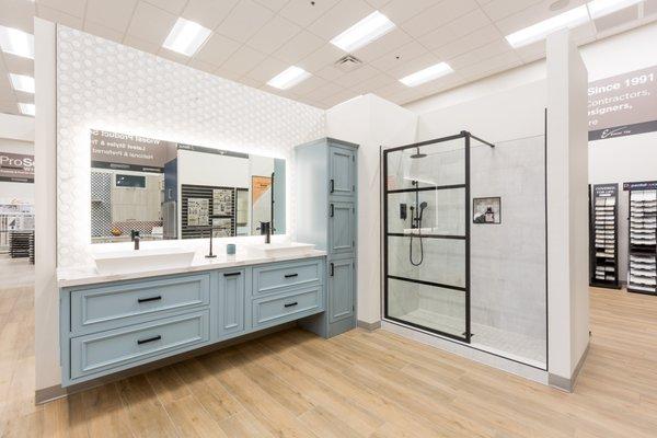 Bathroom vignette showcasing cabinets, backsplash, faucets, fixtures, handles, sinks, mirrors, tile, etc.