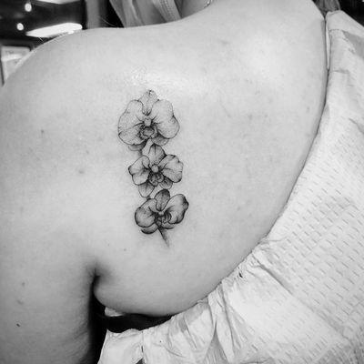 Orchid tattoo by Victoria.