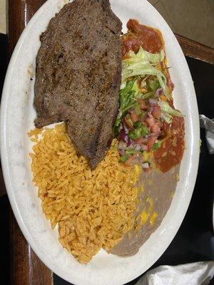 Steak and cheese enchiladas.