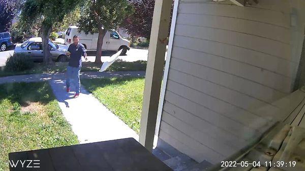 As you can see, he is THROWING MY PACKAGE!  I have a parcel box!! This is UNACCEPTABLE.