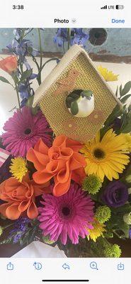 Gorgeous Bird House floral arrangement