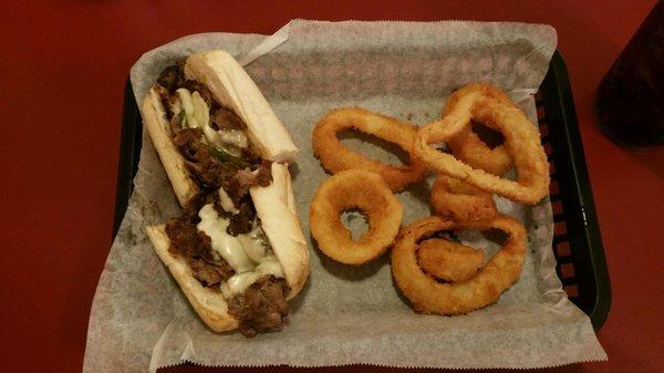 Dry, crusty Philly Cheesesteak with a few onion rings. Overpriced and not tasty.