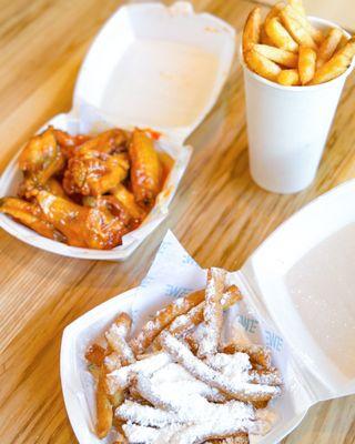 Mango Habanero 8 piece bone in wing, fries, and funnel cake fries.