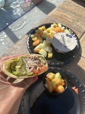 Turkey avocado wrap with fruit cup side  Fruit plate with yogurt