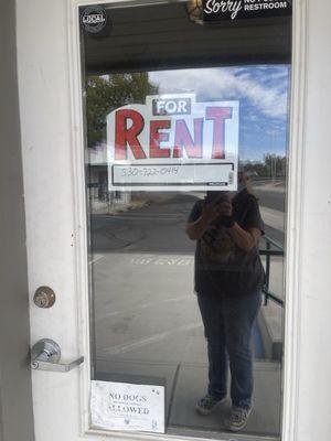 Empty store front and for rent sign in the window!