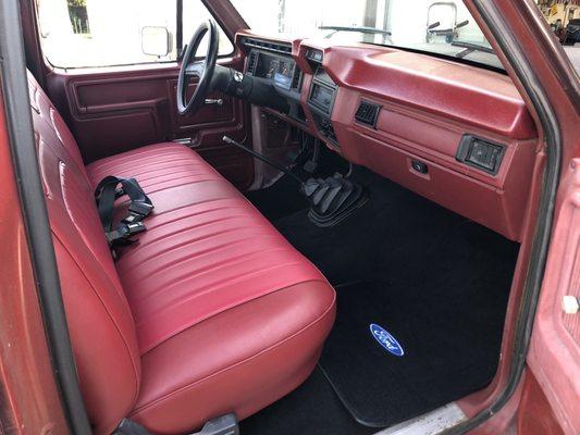 Passenger side new seat and carpet.