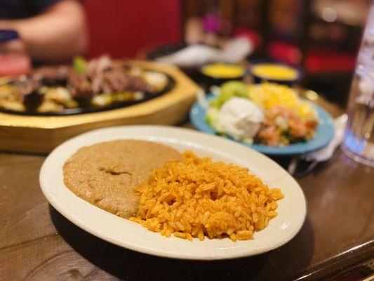 Also comes w/the Fajitas. Authentic Mexican Rice & beans. You will know when you taste them. Winners Circle :)...