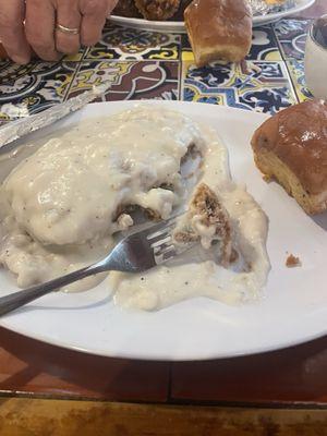 Country fried steak with milk gravy