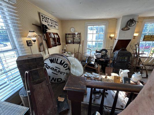 Second floor museum with period things from its past.