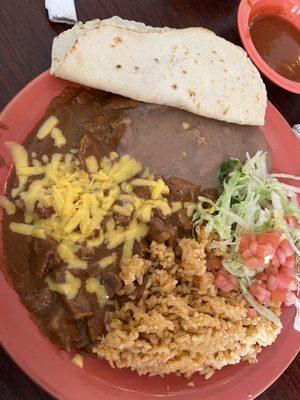 Carne guisada, rice, and beans with fresh homemade flour tortillas