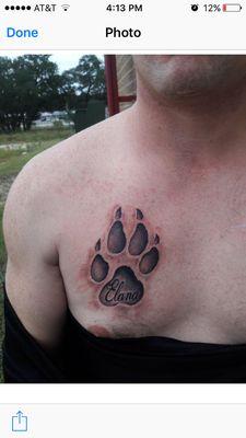 Paw print 3D chest tattoo