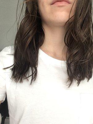 Choppy and uneven ends. Pieces of hair that are randomly way long or way short. One side is longer than the other.