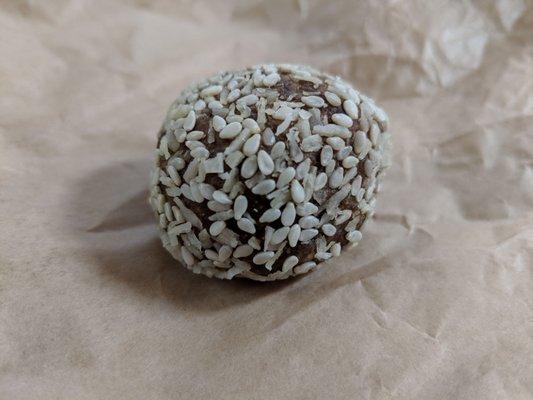 Gluten Free Oja Ball: almond butter, honey, marshmallow root, goji berry, dates, coconut, raisins, sunflower & hemp seeds, ginseng, licorice