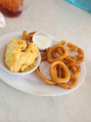 Cheesy potatoes, housemade onion rings, homemade ranch.