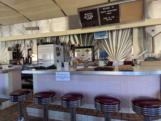 the bar seating/behind the counter