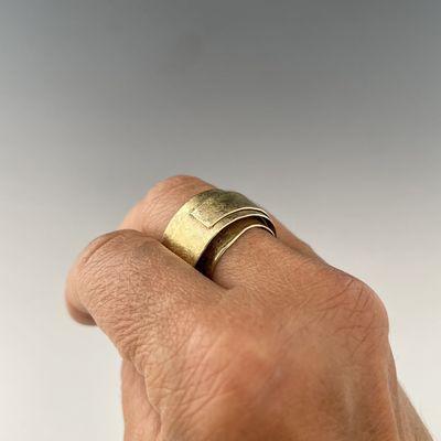 A 14k gold ring with multiple layers