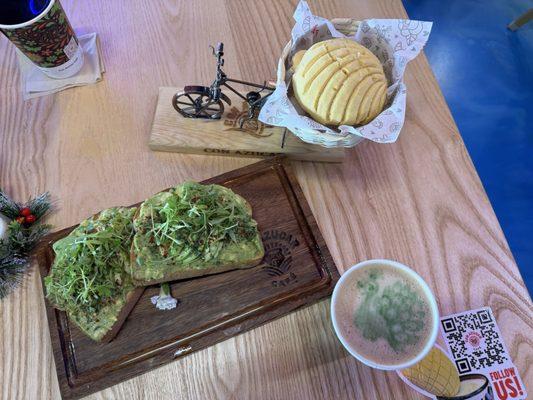 Avocado toast, concha, and cappuccino