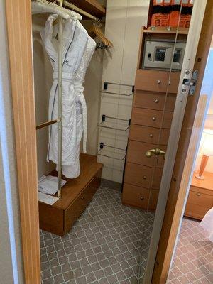 Walk in closet of smaller suite