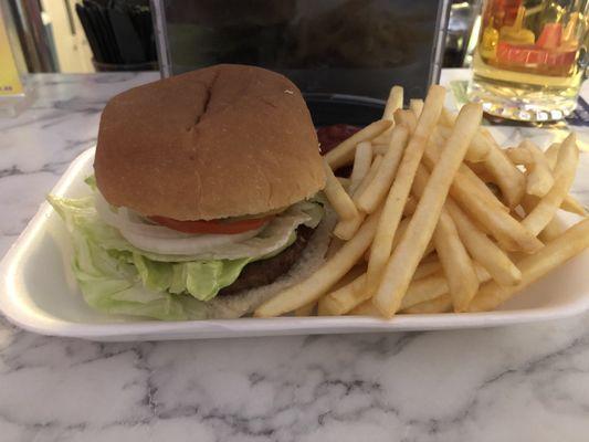 Tom's now sells hamburgers. A hamburger and fries just $7.50! The burger was pretty good.