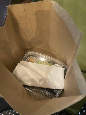 My forgotten salad placed in a to-go container due to waitress forgetting my salad placed in to go container