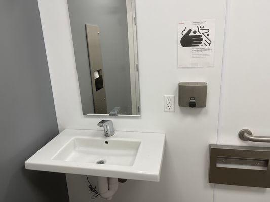 Nasty bathroom at Tesla. Touchless my a$$!