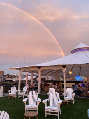 The view behind us of the restaurant and a double rainbow