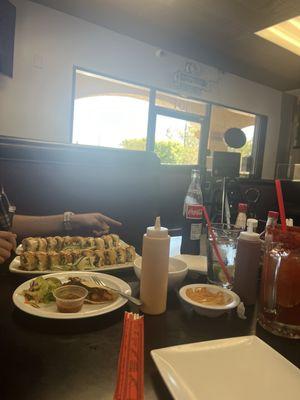 Sushi rolls, gobernador taco and michelada