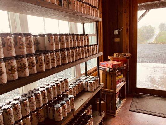 Wall of canned ciders you can purchase and take home with you. The also fill growlers and had bottles to purchase as well.