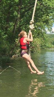 Tree swing fun along the river