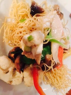 Seafood with pan-fried noodles on my plate