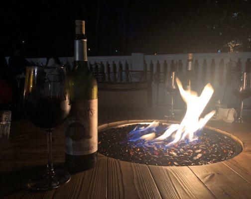 Wonderful fire pit table to enjoy some evening wine.