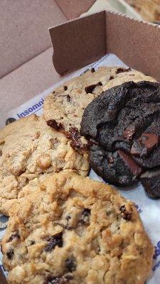 Left is the peanut butter cookie, top right is the chocolate chunk, bottom left is the oatmeal raisin, bottom right is the double chocolate