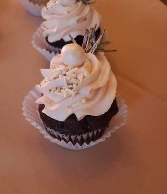 My niece's first birthday cupcakes chocolate filled with ganache