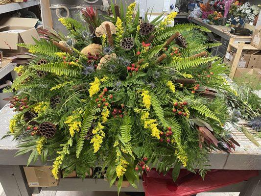 Nature inspired funeral family piece.  Symbolic of one's love for the outdoors and the beauty of the WV woods and mountains.