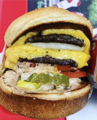 Double, Double Animal Style add chopped chilis, add extra tomatoes, add whole grilled onion.