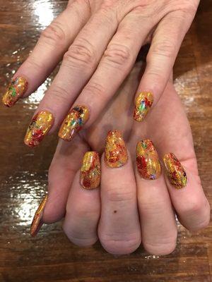 My Thanksgiving Nails! Four weeks and I'm STILL getting tons of compliments! I LOVE this place!! That's why I drive 40 minutes to get here!