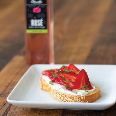 This beautiful plate of Strawberry Prosecco Toast with Whipped Honey Goat Cheese will impress any guest!