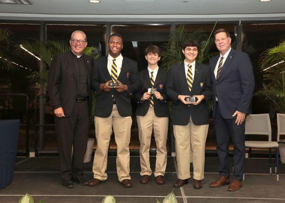 Belen Jesuit Preparatory School President Fr. Willie and Principal Mr Roca with students at the high school award ceremony in 2024.