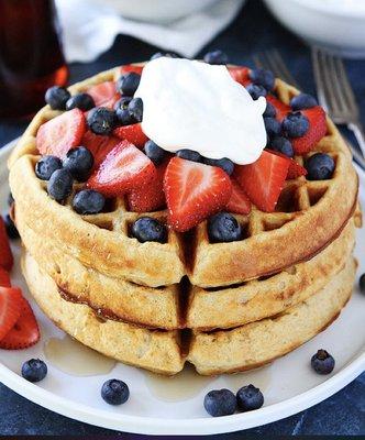 Our homemade Belgian waffle with fruit and whipped cream