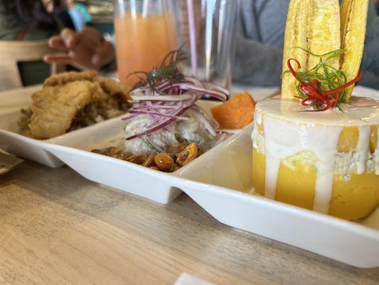 Trio: La Ronda Brava (Ceviche, Causa, Jalea Mixta). Deep fried seafood, fish ceviche and causa- spicy layers of potatoes w/chicken salad.