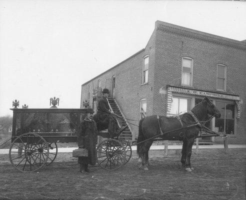 Andrew Campbell and George Murch in front of Campbell's Undertaking - 1909