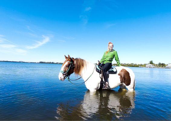 Horseback riding in ocean and riding on the beach in Florida