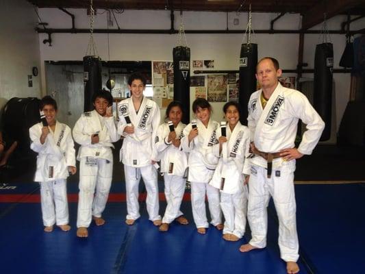 Some of the kids Jiu-Jitsu Team showing off their new stripes on their belts!