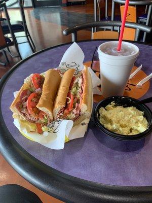 Foot long Italian, potato salad, and a small iced tea. Cost about $18.50,  pricing