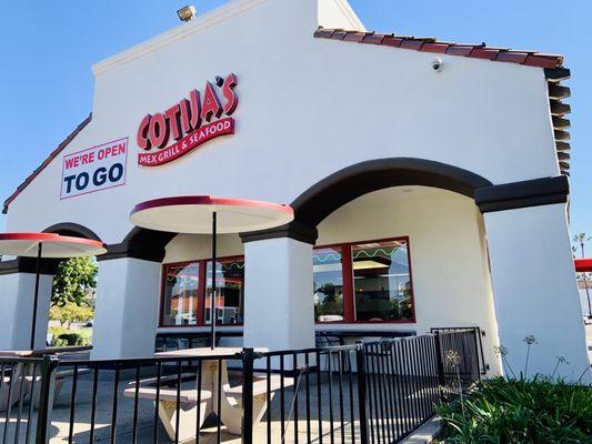 View of the outside dining area from the drive thru