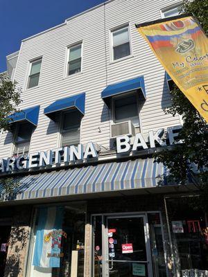 Outside Argentina bakery, open 7am to 7pm but closed mondays